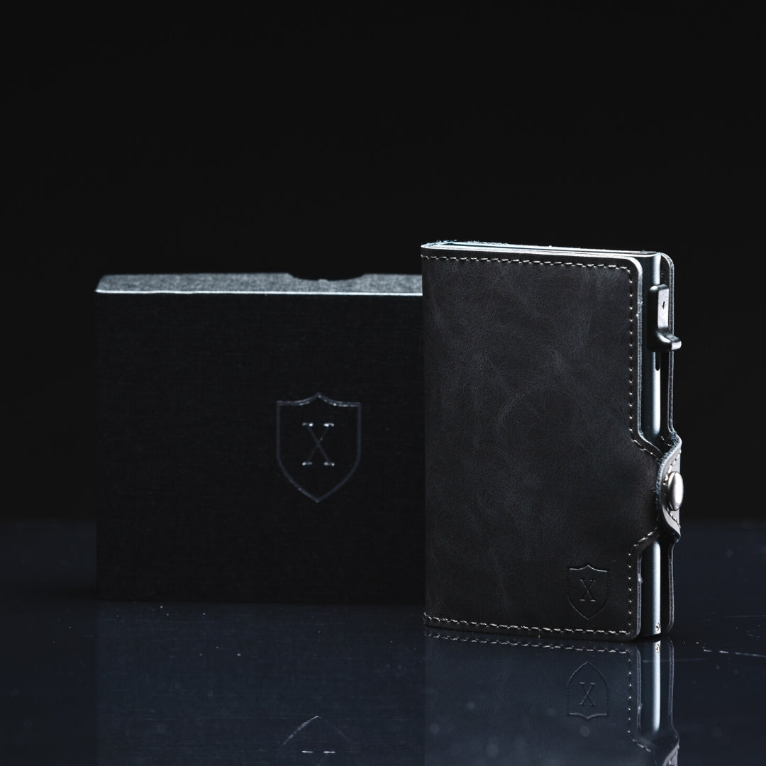 Billetera Xclusive Modelo Deluxe Dark Grey con su caja de reglao